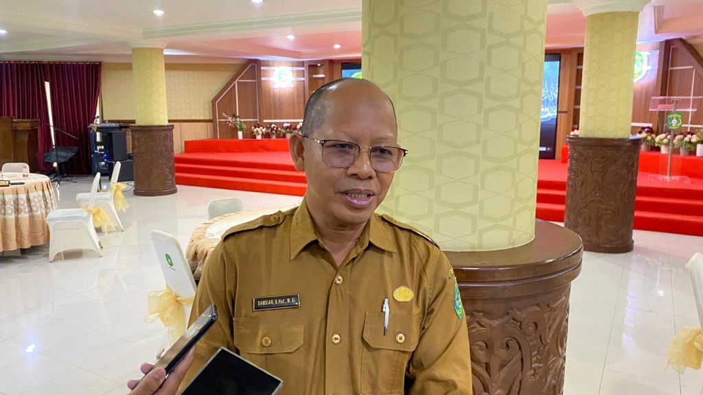 Samsiar, Kabid Usaha dan Penyuluhan Disbun Kukar, saat wawancara terkait evaluasi kebun plasma perusahaan sawit di Kukar.
